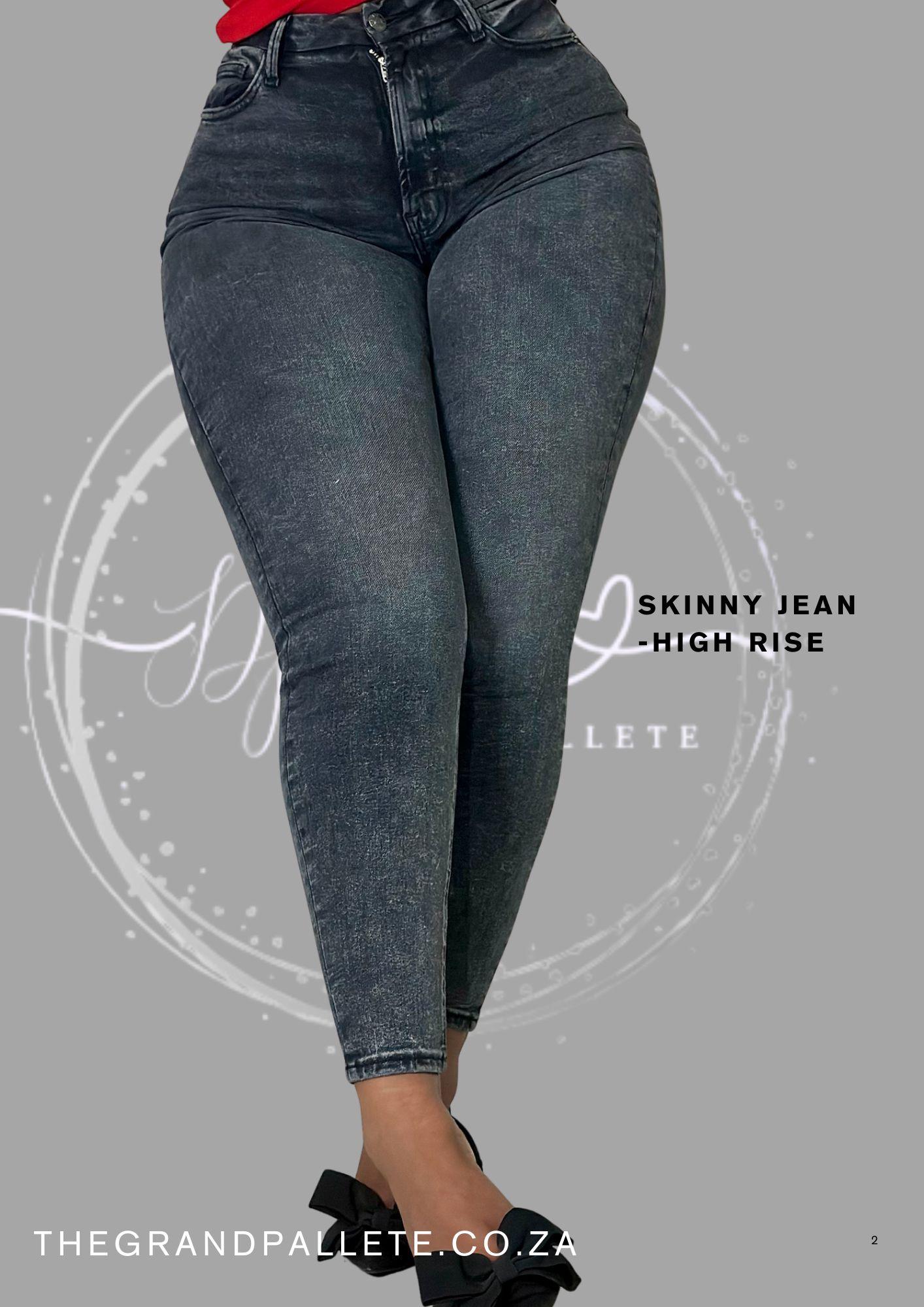 Gray skinny jeans with 'The Grand Pallete' branding on a gray background